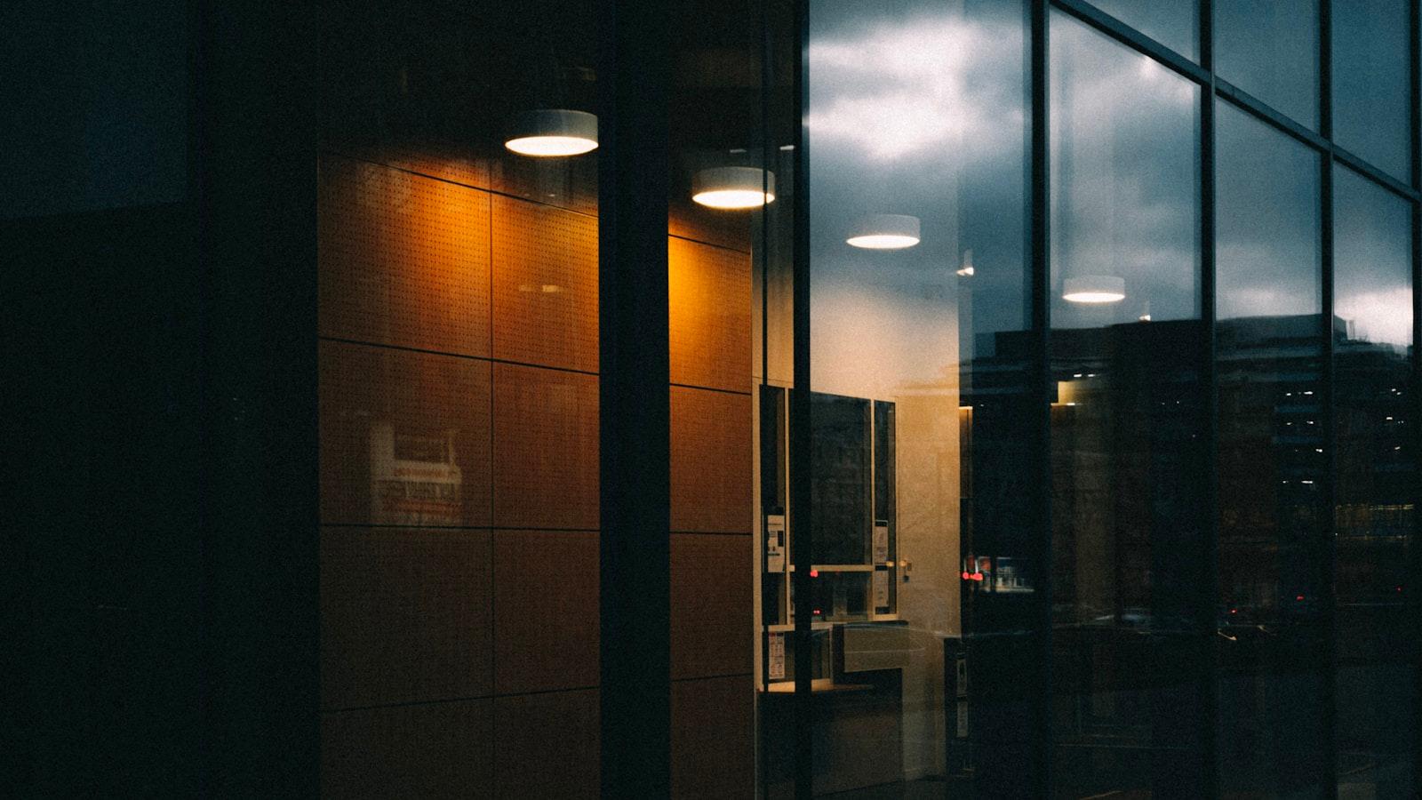 a building with a lot of windows and a sky in the background