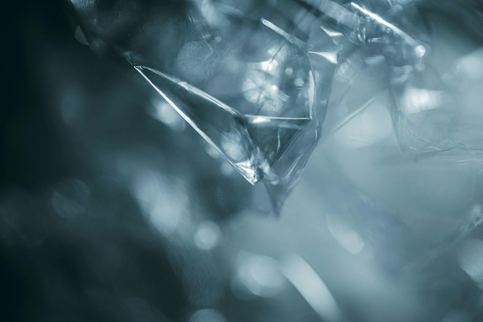 Abstract shapes and light create a cool, ethereal atmosphere.