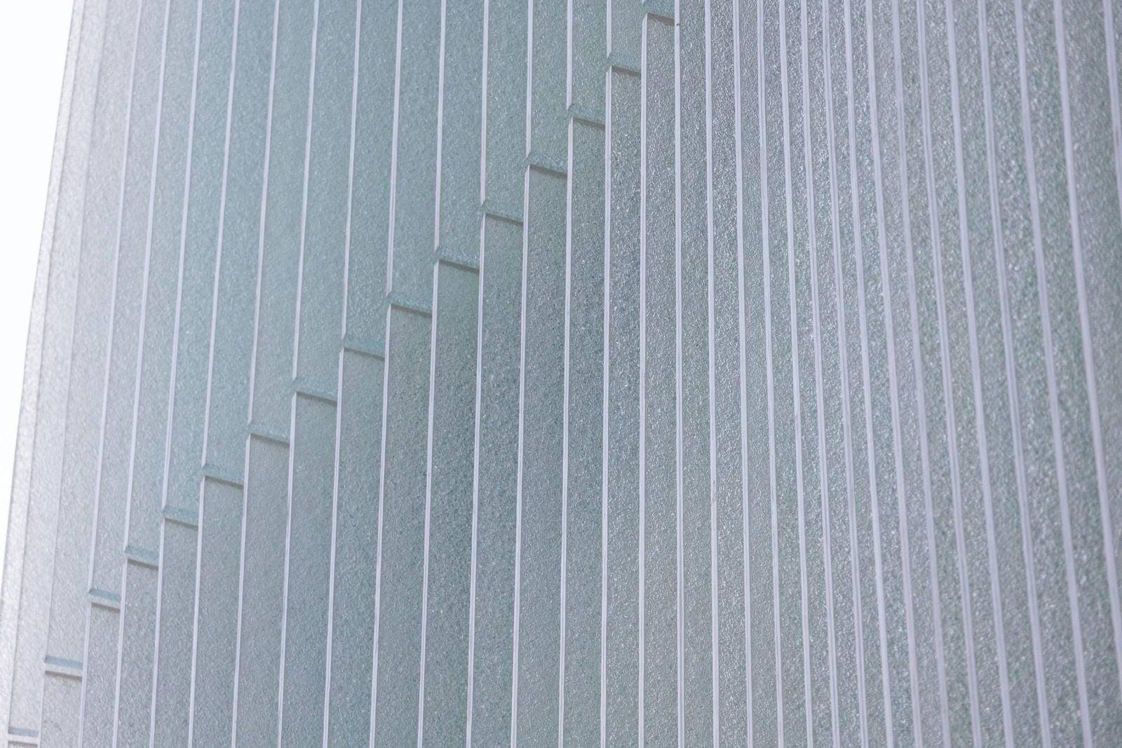 Modern building facade with repeating vertical lines