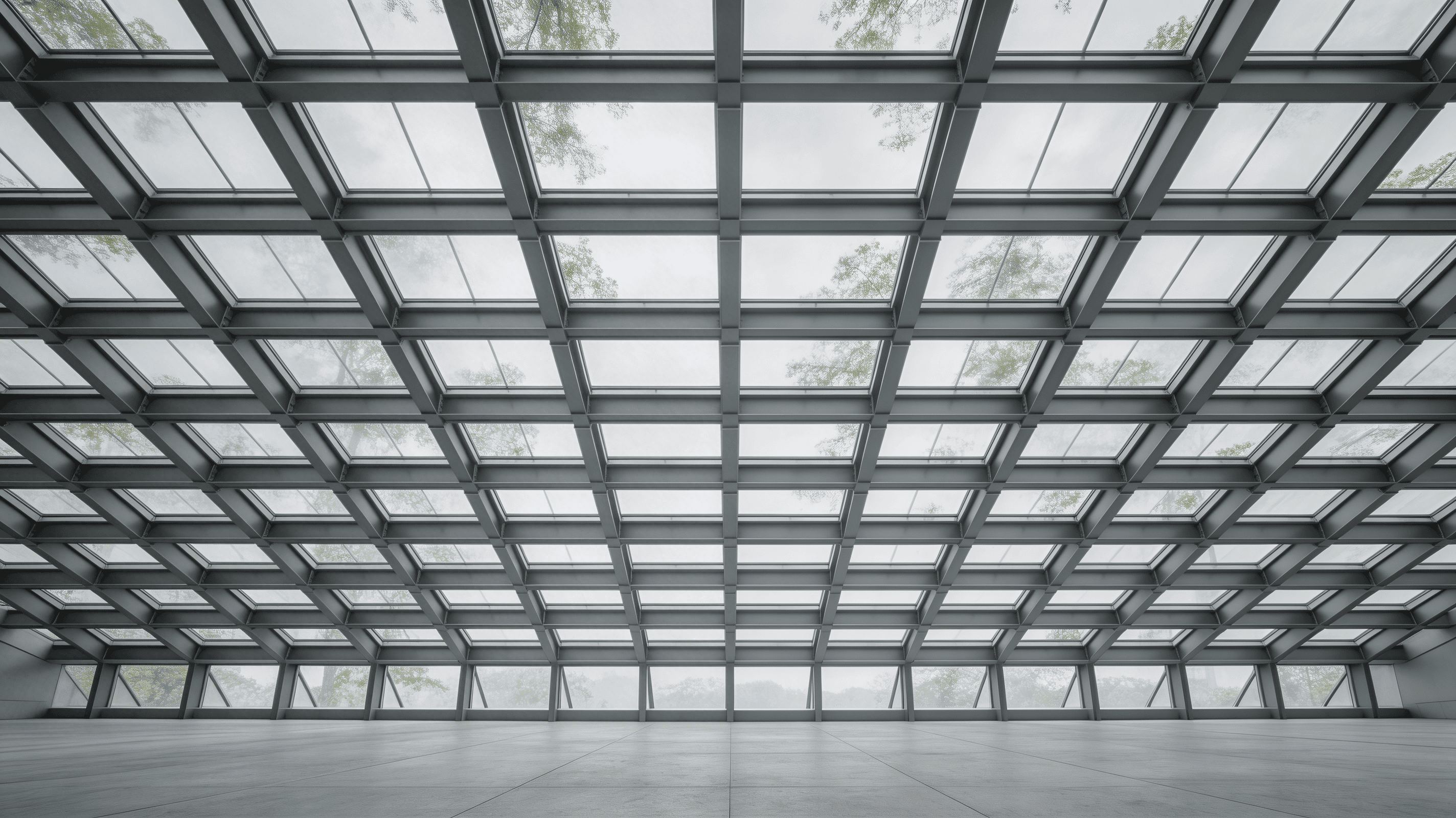 An expansive glass atrium of a modern corporate building shot from below, geometric steel beams forming a lattice pattern against an overcast sky, with faint reflections of greenery on the glass panels